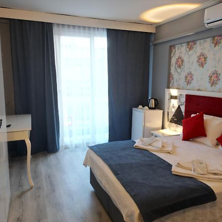 Akman City Hotel 库萨达斯 外观 照片