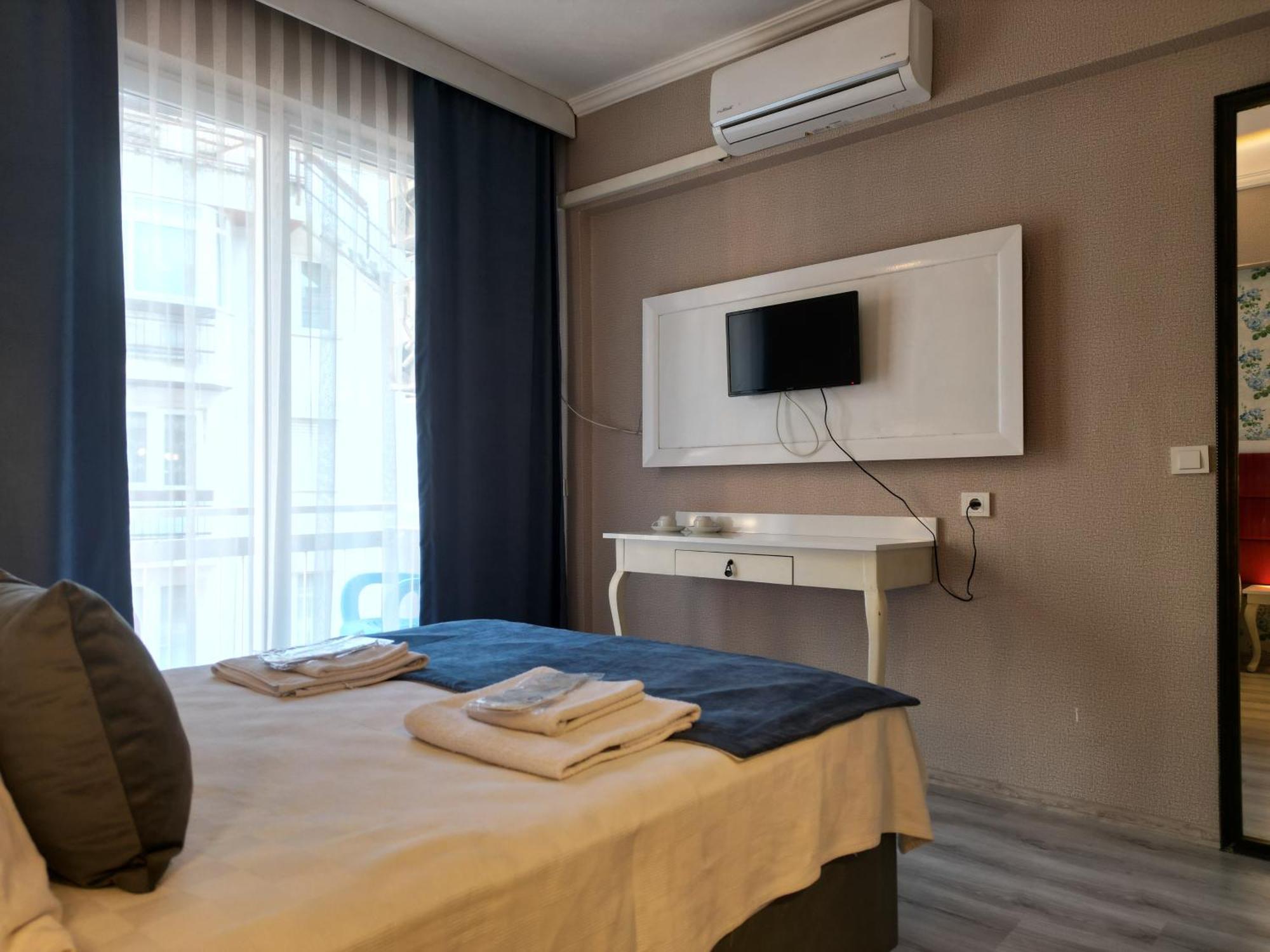 Akman City Hotel 库萨达斯 外观 照片