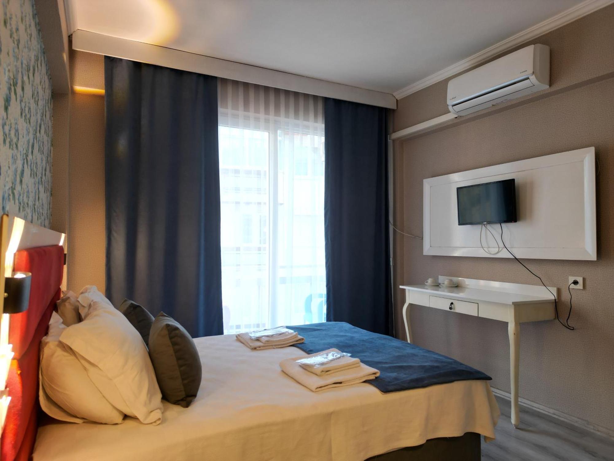 Akman City Hotel 库萨达斯 外观 照片